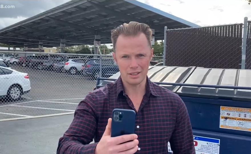 A screenshot of footage showing Robert Wilson speaking to CBS 8 reporter, David Gotfredson, outside a San Diego courthouse on Dec. 27, 2021.