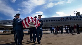 Air Force Honor Guard members carry the remains of Col. Wendell Keller, of Fargo, N.D., and Capt.Virgil K. Meroney, of Fayetteville, Ark., at Ronald Reagan Washington National Airport Oct. 18, 2012. 