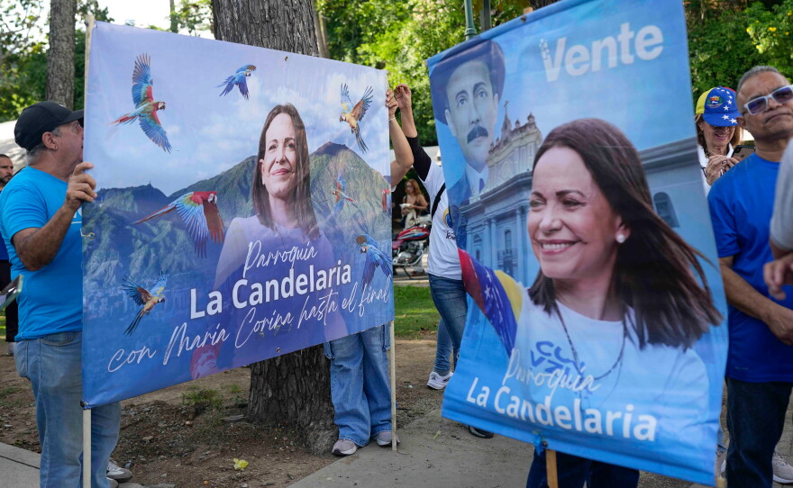 Supporters of opposition leader Maria Corina Machado gather to demand that a date be set for presidential elections in Caracas, Venezuela, Thursday, Oct. 22, 2026.