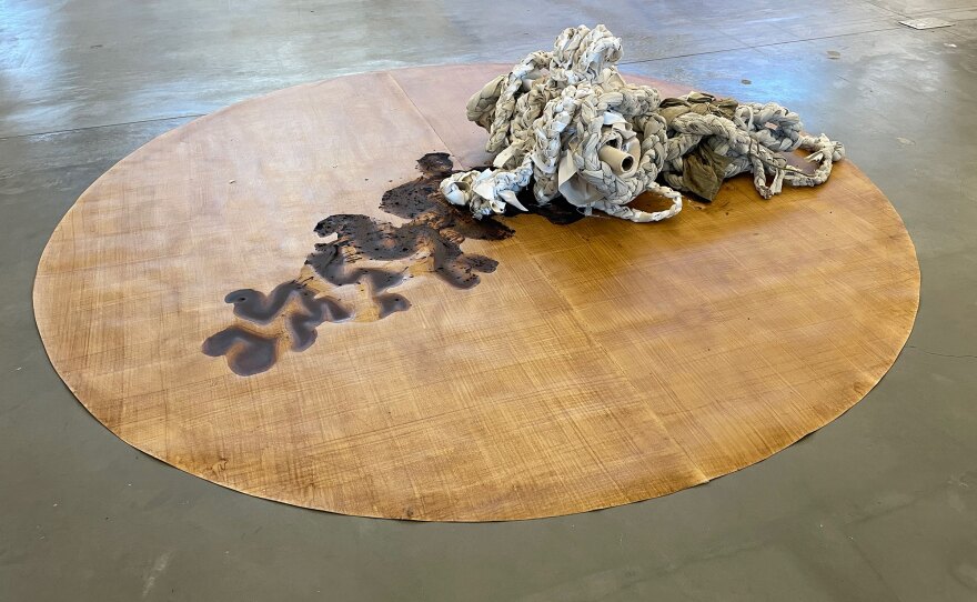 Carmen Argote's "I'm taking all I can carry" is an action-based work that the artist completed on the installation's opening day, shown in a July 1, 2022 photo.