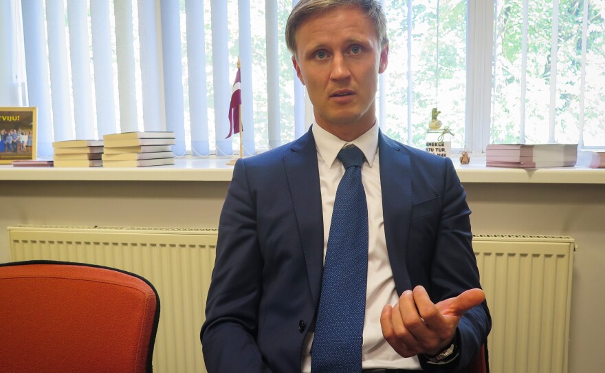 Rihards Kols is a nationalist member of Latvia's parliament who believes his country must protect its language from Russian influence.
