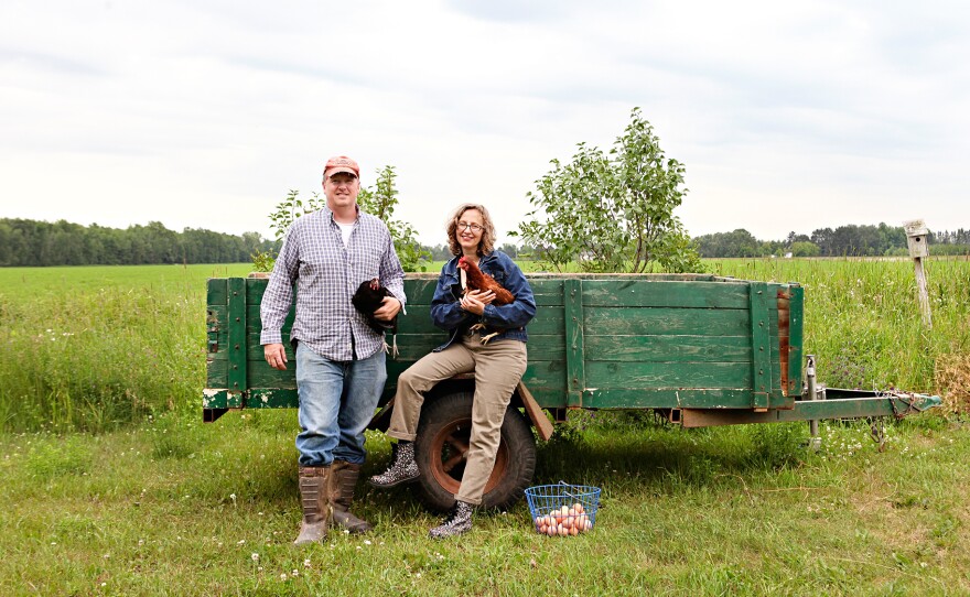 Jason and Lucie Amundsen on their farm in in Wrenshall, Minn.