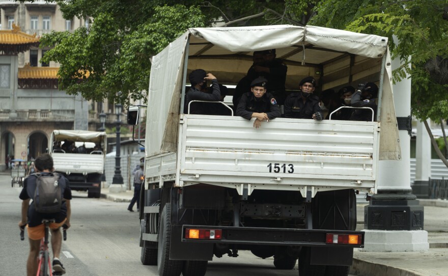 A truck of special forces police sits parked outside National Capitol building in Havana, Cuba, Wednesday, July 14, 2021, days after protests.