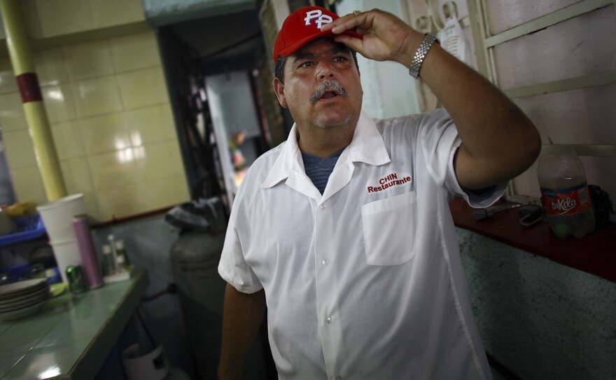 Onil Lemus is the owner of Chins, a small restaurant in Mariel. Three of his brothers left for the United States in the 1980s and '90s. He says the mood is changing for the better in Mariel, thanks to the construction of the port and the loosening of restrictions on private businesses.