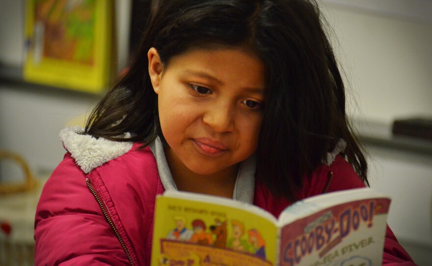 Yasmin Gonzalez reads a fun mystery during her independent reading time.