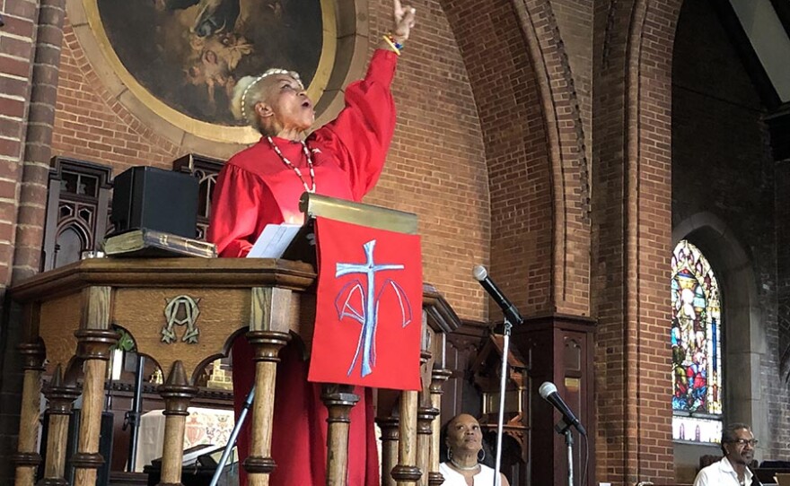 Rev. Magora Kennedy leads a worship service in Harlem to commemorate the 50th anniversary of the 1969 Stonewall uprising. Now 81, Kennedy spoke about her decades of activism on behalf of LGBTQ equality and racial justice.