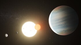 Artist's rendition of the Kepler-47 circumbinary planet system with its three planets is pictured in this undated image. 