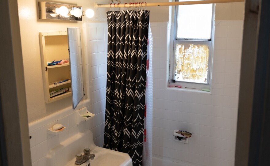 Jesús González says that the landlord recently repainted his bathroom after a drawn-out dispute.