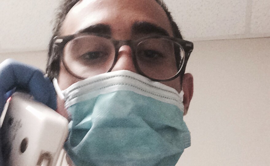 Sami Yenigun had to put on a mask and gloves when he arrived at the hospital in Washington, D.C.