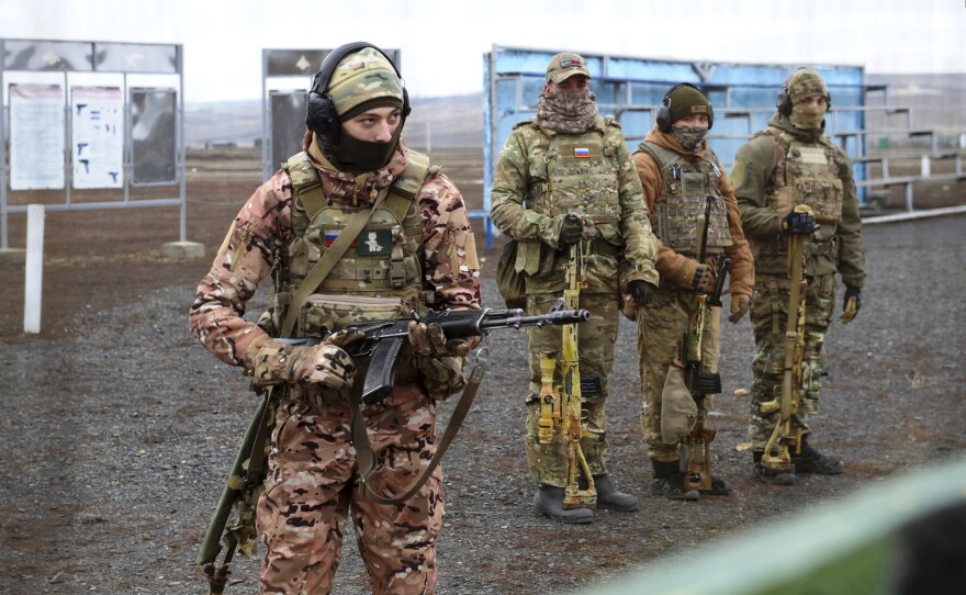 Russian troops take part in drills at the Kadamovskiy firing range in the Rostov region in southern Russia on Dec. 14, 2021. Russia on Tuesday carried out military exercises in the Rostov region near its border with Ukraine.