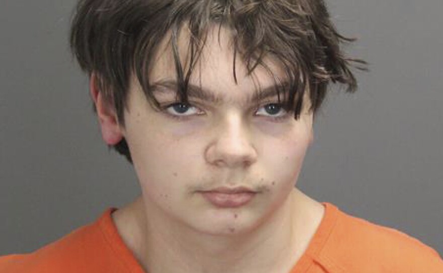 This booking photo released by the Oakland County, Mich., Sheriff's Office shows Ethan Crumbley, 15, who is charged as an adult with murder and terrorism for a shooting that killed four fellow students and injured more at Oxford High School in Oxford, Mich.