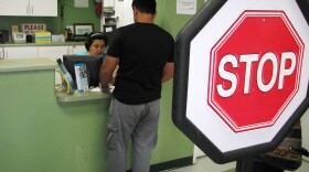 A Middle Eastern man checks in for his appointment at La Maestra Family Clinic in El Cajon.

