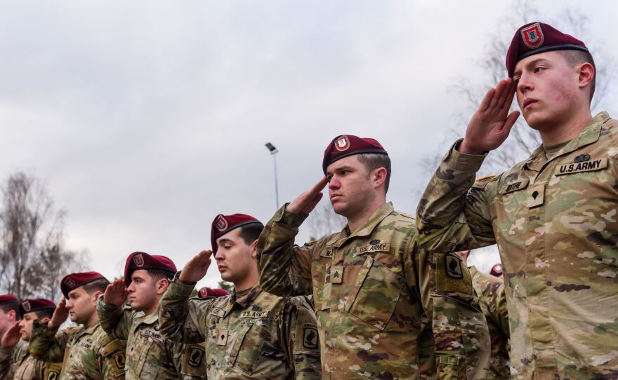 Soldiers of an airborne brigade of the U.S. Army stand at the Adazi Military Base of the Latvian armed forces in upon arrival Friday for their mission to strengthen the NATO presence in the region.