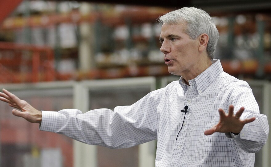 Sen. Rob Portman, R-Ohio, conducts a town hall meeting with employees after an October 2014 tour of Harris Products Group in Mason, Ohio.