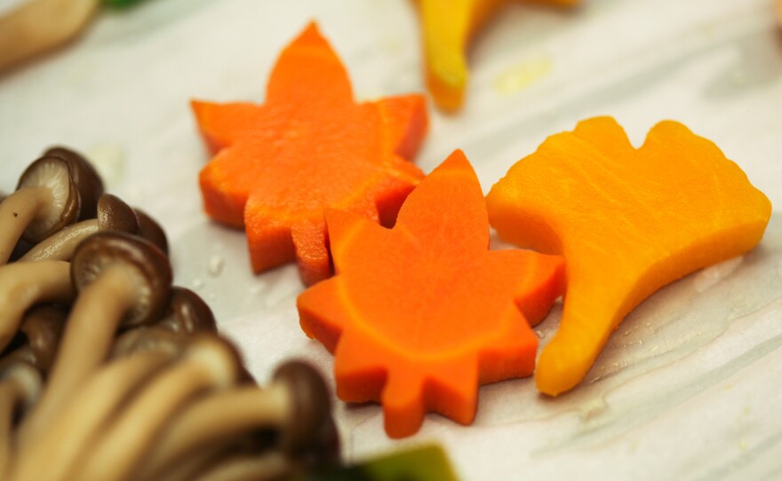 Carrots and pumpkin in the shape of leaves.