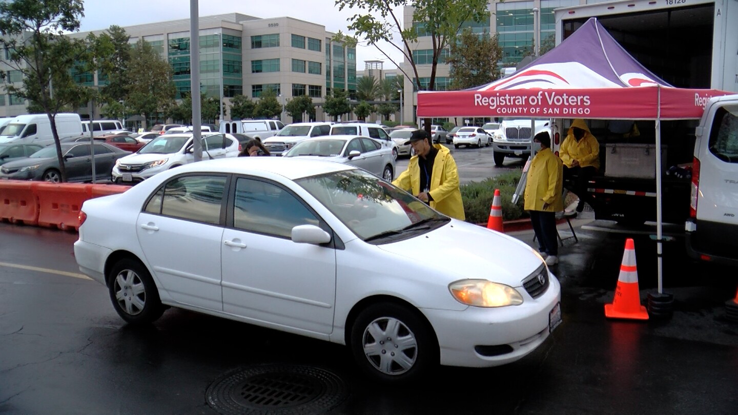 Voters utilizing the curbside ballot drop off at the Registrar of Voters in Kearny Mesa, Nov. 8, 2022.