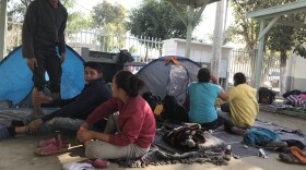 Migrants rest at the Tijuana sports facility Benito Juarez, which has been turned into a makeshift shelter, November 15, 2018. 
