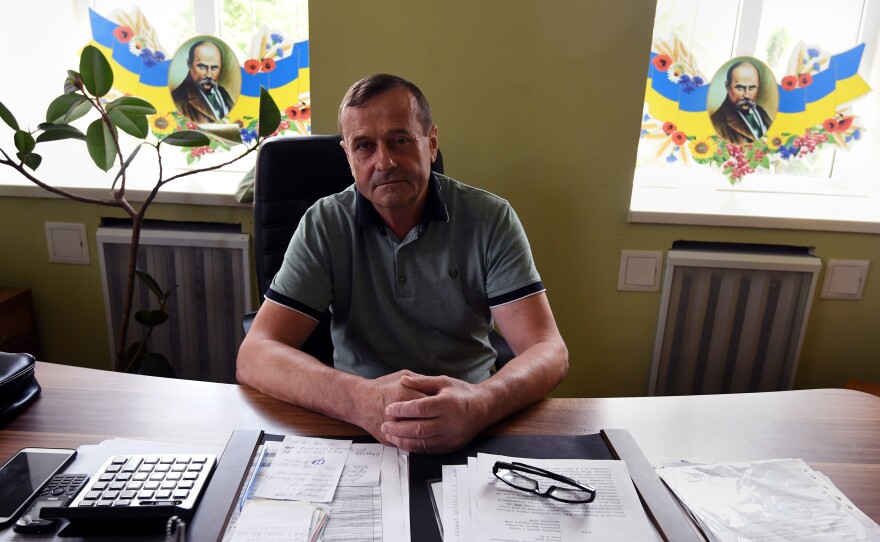 Mykola Dyachenko is a local administrator in Nova Basan. There is still a bullet hole in his office from the Russian invasion.