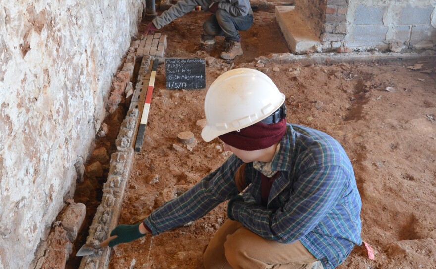 Archaeologists uncover the original brick floor of what is believed to be Sally Hemings' living quarters at Monticello.