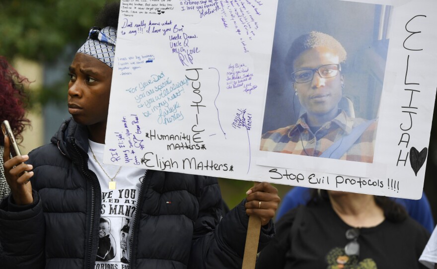 Rashiaa Veal holds a sign of her cousin, Elijah McClain at a October 2019 news conference in front of the Aurora Municipal Center. Family, friends, legal counsel, local pastors and community organizers were calling for justice for the officer-involved death of McClain.