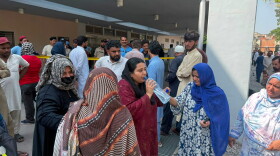 Relatives of the children who died in a hospital fire, gather at the hospital, in Islamabad, Pakistan, Wednesday, Aug. 26, 2026.