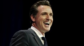 California Lt. Gov. Gavin Newsom is seen smiling while speaking at the California Democrats State Convention in Los Angeles on March 8, 2014.
