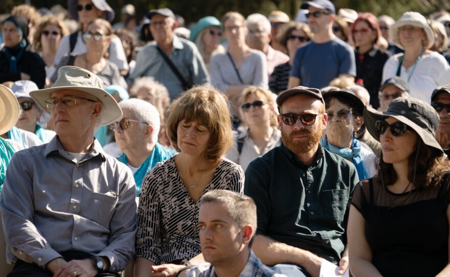 Vivian Silver's family listens to eulogies during a service on Thursday. Silver, who had been missing and presumed to be a hostage since Hamas' attacks on Oct. 7, was confirmed dead this week after her DNA was found in the ashes of her home.