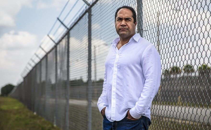 Kareen Troy Troitino, a guard at the Federal Correctional Institution, stands outside the Miami facility in April.