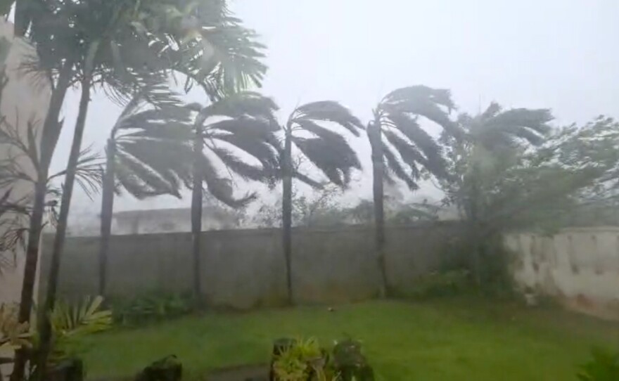 This image provided by Glen Hunter, shows high winds during a super typhoon on Tuesday, April 14, 2026 in the island of Saipan.