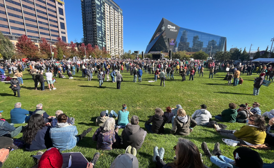 Thousands gathered in The Commons park in downtown Minneapolis as part of the No Kings early vote rally on Saturday, Oct. 17. Speakers including Minnesota Attorney General Keith Ellison and former Minneapolis Mayor R.T. Rybak encouraged attendees to vote early and push their neighbors to do the same.