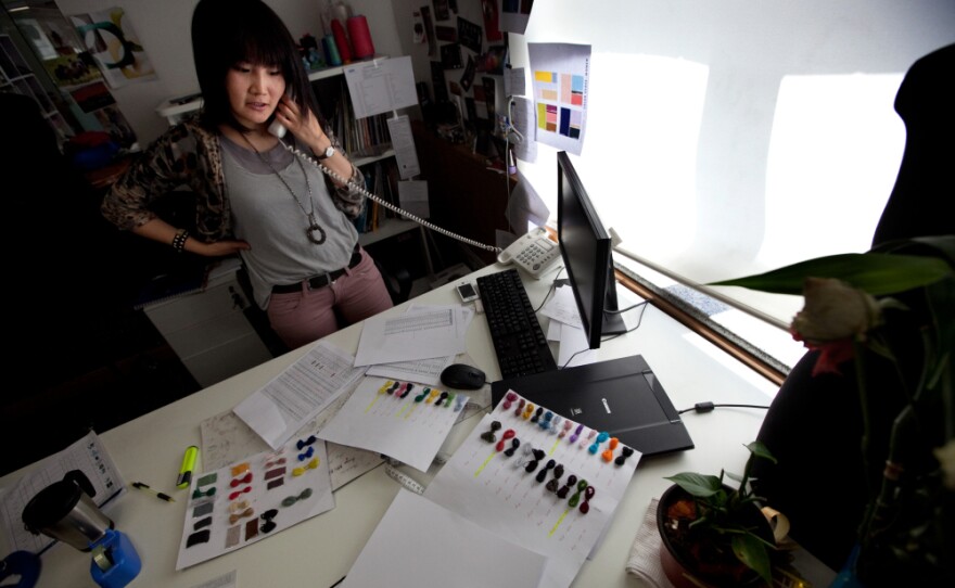 Clothing designer Ariunaa Suri works in her office at the Gobi cashmere company in Ulan Bator. Before mining, cashmere was Mongolia's main export.