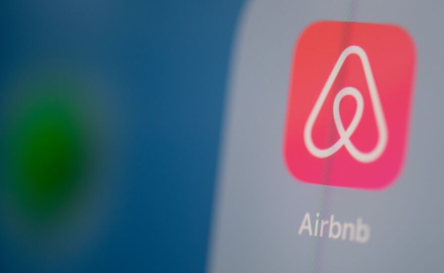 Airbnb is listing shares of its initial public offering Thursday, capping a tumultuous year for the short-term rental company.