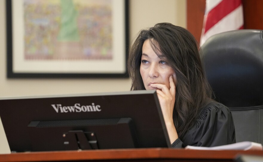 Utah District Judge Dianna Gibson presides during a hearing in 2024. She ruled in 2025 that the Republican-led legislature had violated laws against gerrymandering in how it drew the congressional map.