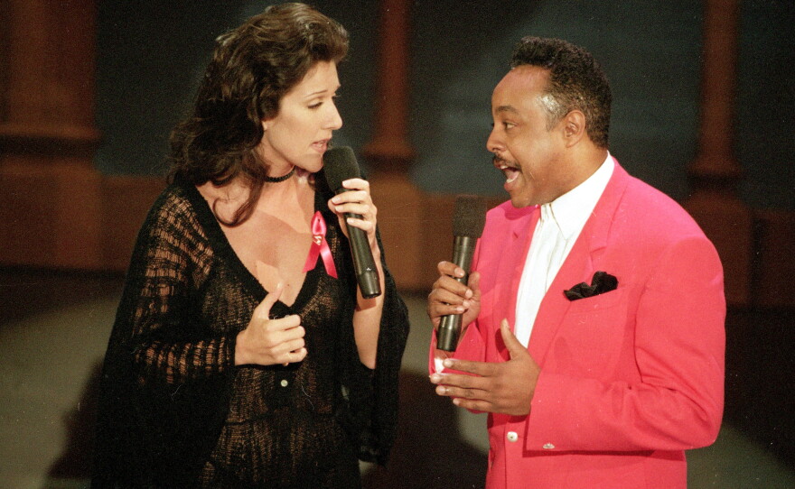 FILE - Celine Dion, left, and Peabo Bryson perform the song "Beauty and the Beast," that won them the Grammy for Best Pop Vocal Performance by a Group or Duo, at the 35th annual Grammy Awards in Los Angeles, Calif., Feb. 25, 1993.