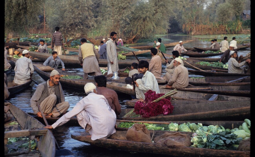 Even during times of peak militancy — such as when the author visited in 1993 and took this photograph — Dal Lake's floating wholesale produce market remained open.