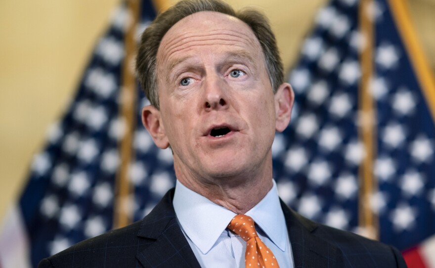 Sen. Pat Toomey, the ranking member of the Senate Banking Committee, addresses reporters on Feb. 15, in Washington, D.C. Committee Republicans, led by Toomey, boycotted a panel vote on President Biden's nominees to the Federal Reserve.