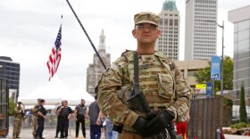 The National guard stands outside the BOK Center where President Trump will hold a rally in Tulsa, Okla., Saturday, June 20, 2020. 