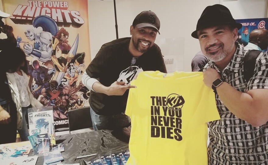 Keithan Jones, founder of KID Comics and Black Comix Day, with Aaron Nabus at the 2018 Black Comix Day. Feb. 20, 2018