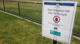 A sign at the Lopez Ridge Park in Mira Mesa saying irrigation is off in the area because of the drought, June 15, 2015.