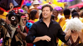Harry Connick, Jr. second-lining through the French Quarter in New Orleans in "Sunshine By The Stars: Celebrating Louisiana Music."