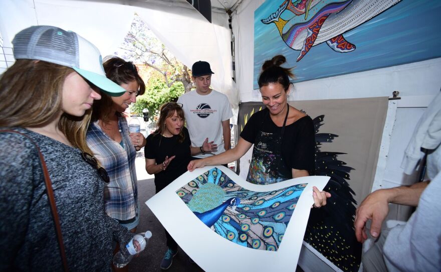 A 2016 photo of Australian artist Danielle Mate Sullivan at ArtWalk in Little Italy.