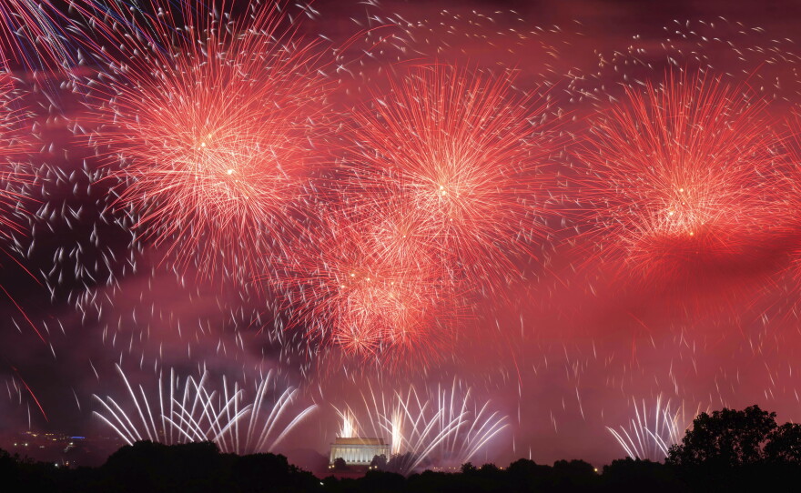 Fireworks explode over the Lincoln Memorial during Salute to America, an Independence Day event honoring the nation's 250th anniversary, early Sunday, July 5, 2026, on the National Mall in Washington as seen from Arlington, Va.