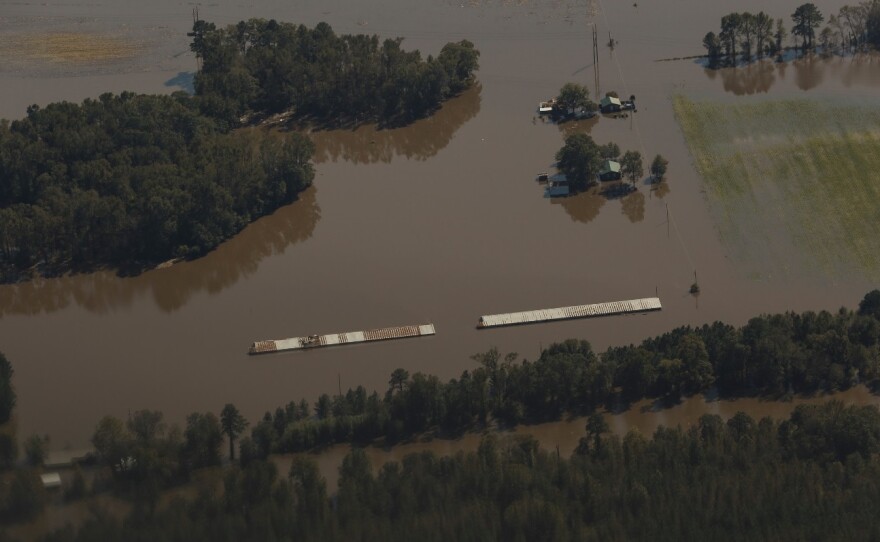 Aerial shots of a poultry farm near the Neuse River, in North Carolina, before and during flooding.