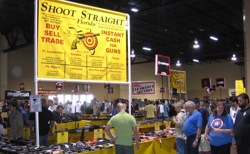 Attendees at a gun show in Miami have mixed feelings about Obama's executive actions.