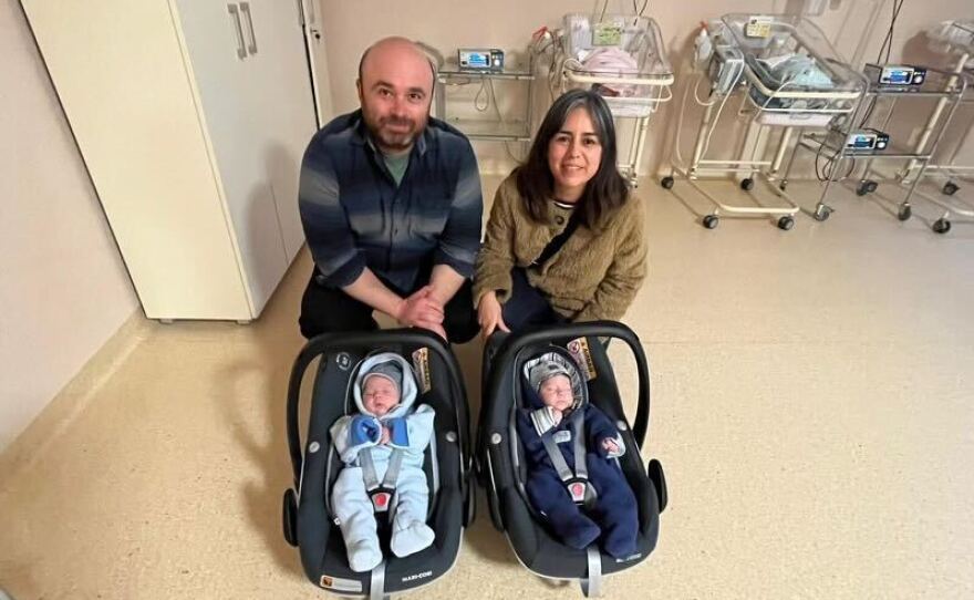 Alex and Irma with their twins.