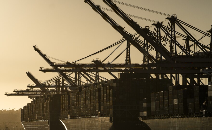 Bottlenecks have formed during the coronavirus pandemic at U.S. ports, causing shipping delays. Here, the CMA CGM Theodore Roosevelt (far left) and CMA CGM Panama (middle) container ships are moored at the Port of Los Angeles.