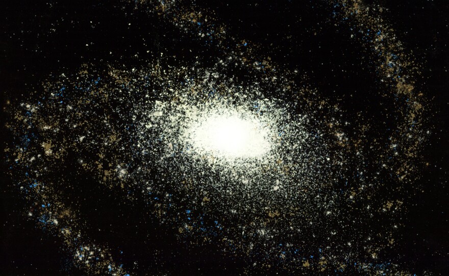 Spiral galaxy: baking soda, curry powder, salt, sugar, cinnamon, chalk.