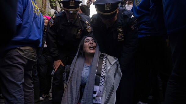 Police detain Nerdeen Kiswani, an organizer of pro-Palestinian demonstration group "Within Our Lifetime" during a protest on Friday, April 12, 2024, in New York.