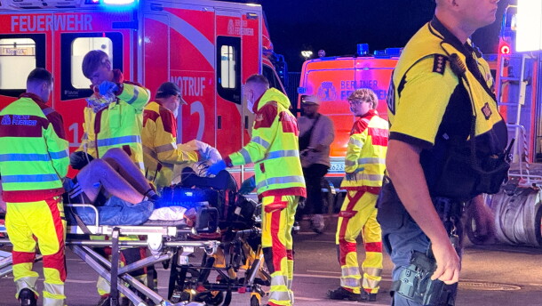 Emergency personnel tend to a person on a stretcher following the cancellation of Christopher Street Day in Berlin on Saturday, July 25, 2026.