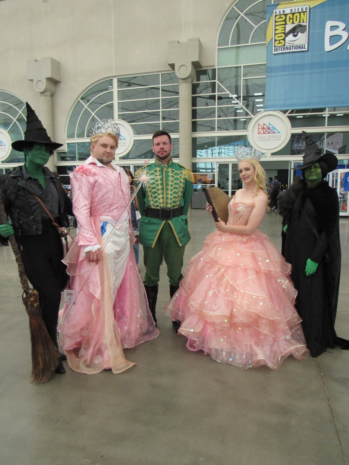 Comic-Con attendees pose as cast members from the film "Wicked" at the San Diego Convention Center on July 26, 2025.